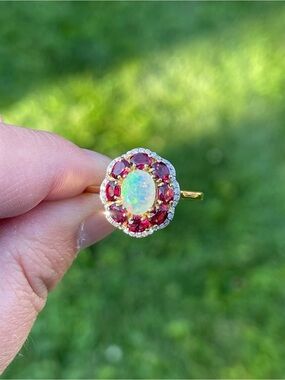 Ethiopian Welo Opal and Garnet Halo Ring